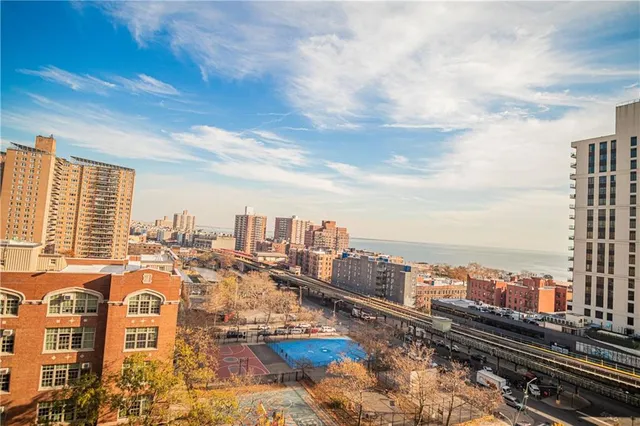 a view of a city with train tracks