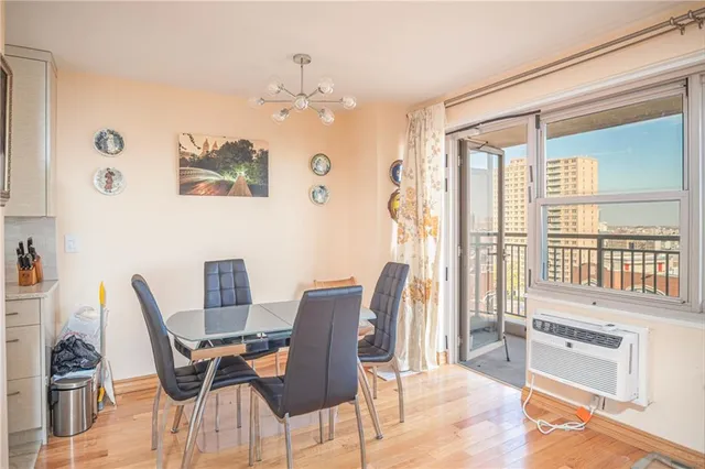 a dining room with furniture and window