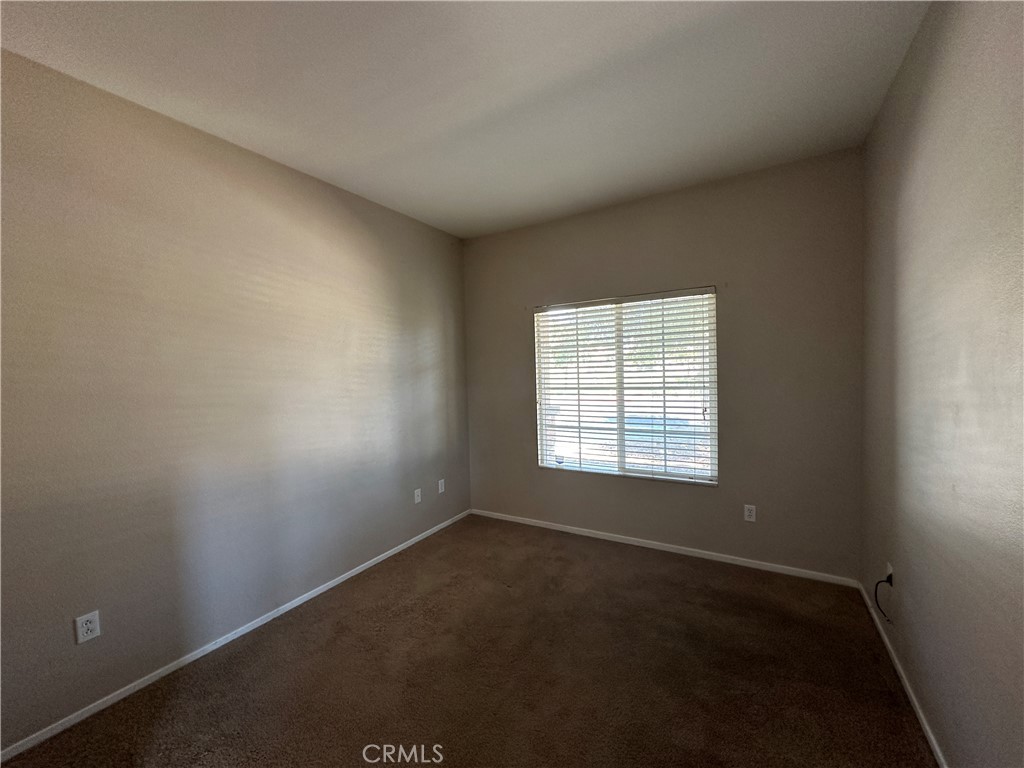 5231 Inglestone Drive Hemet, CA 92545 - Photo 11 of 75 an empty room with a window