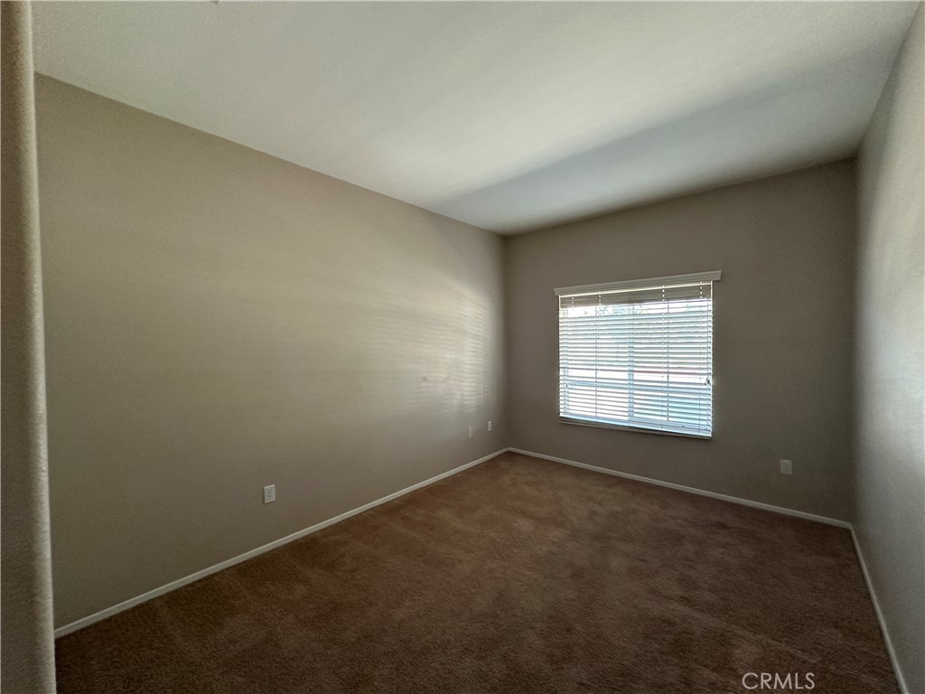 5231 Inglestone Drive Hemet, CA 92545 - Photo 15 of 75 an empty room with a window