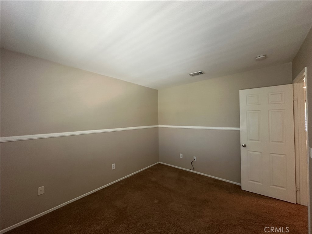 5231 Inglestone Drive Hemet, CA 92545 - Photo 49 of 75 an empty room with a empty space