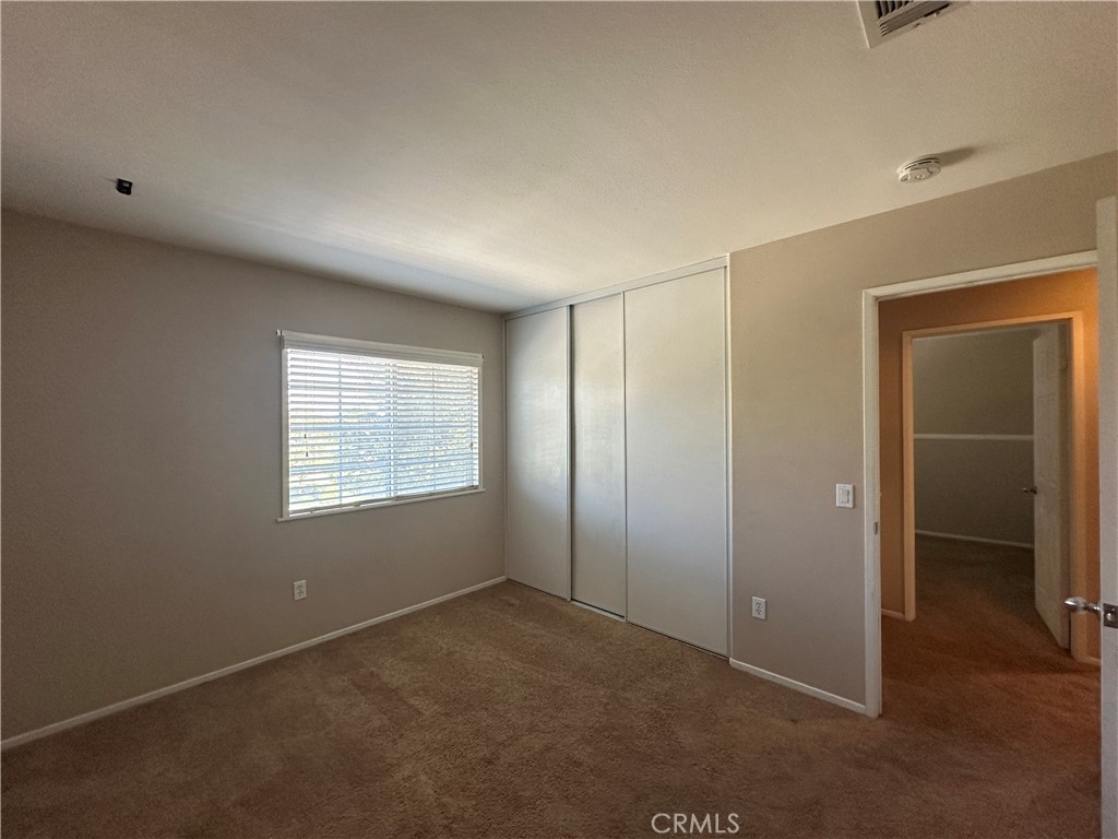 5231 Inglestone Drive Hemet, CA 92545 - Photo 51 of 75 a view of an empty room with a window