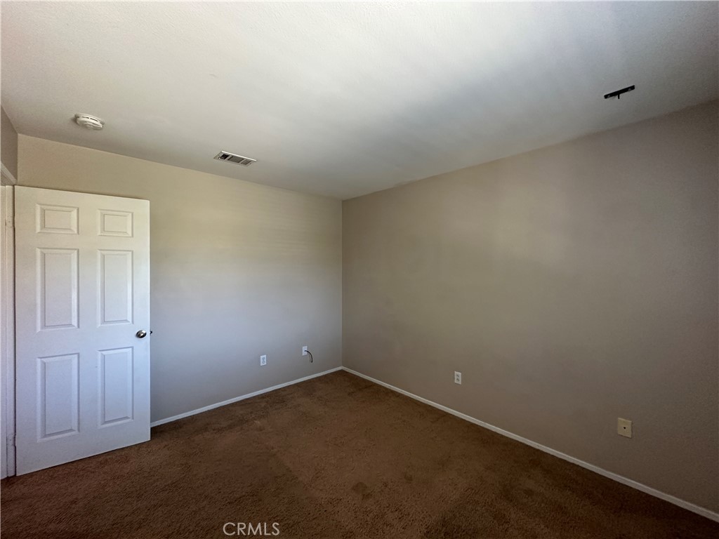 5231 Inglestone Drive Hemet, CA 92545 - Photo 53 of 75 an empty room with a empty space