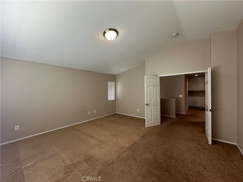5231 Inglestone Drive Hemet, CA 92545 - Photo 59 of 75 an empty room with an entryway
