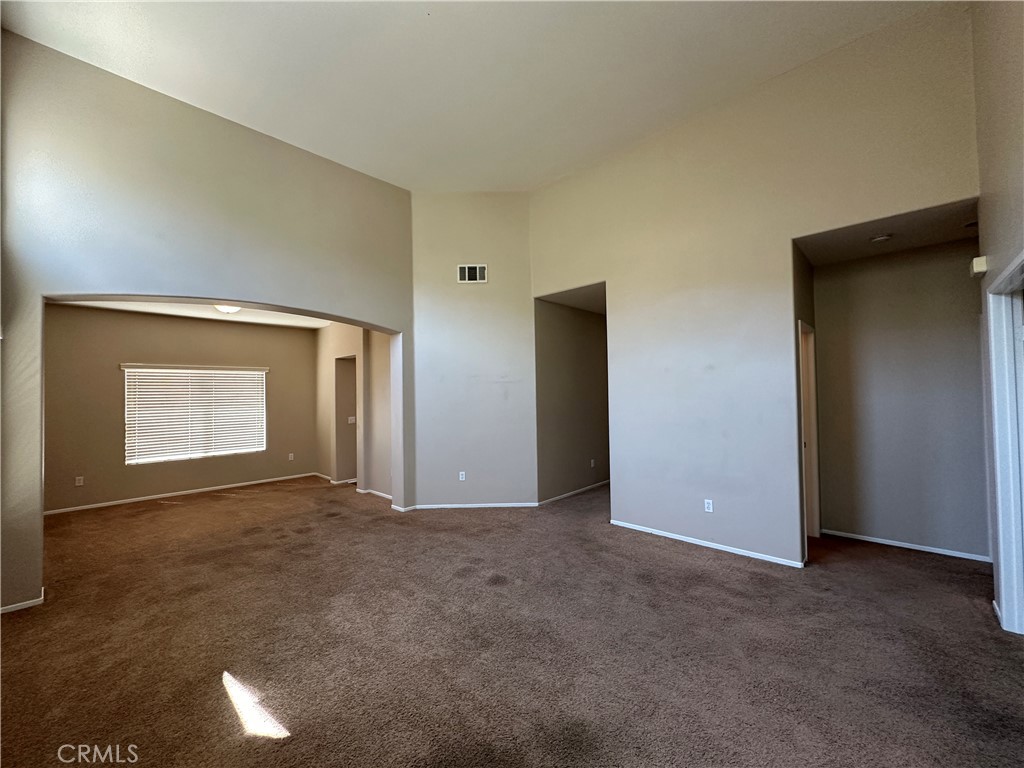 5231 Inglestone Drive Hemet, CA 92545 - Photo 6 of 75 a view of an empty room with a window
