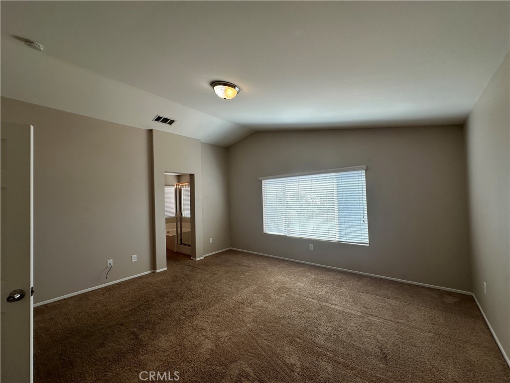 5231 Inglestone Drive Hemet, CA 92545 - Photo 61 of 75 an empty room with windows