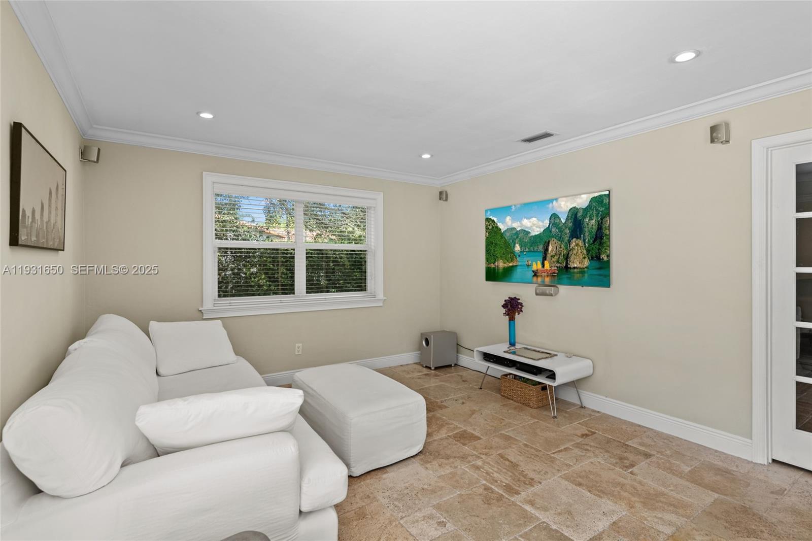 7360 Southwest 115th Street Pinecrest, FL 33156 - Photo 22 of 49 a living room with furniture and a window
