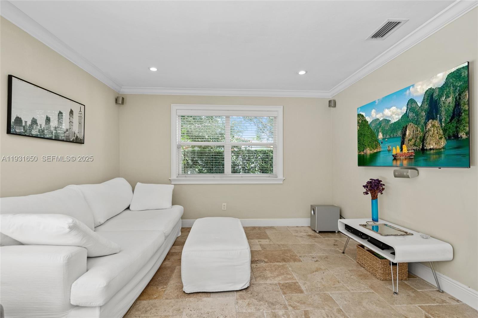 7360 Southwest 115th Street Pinecrest, FL 33156 - Photo 23 of 49 a living room with furniture and a window