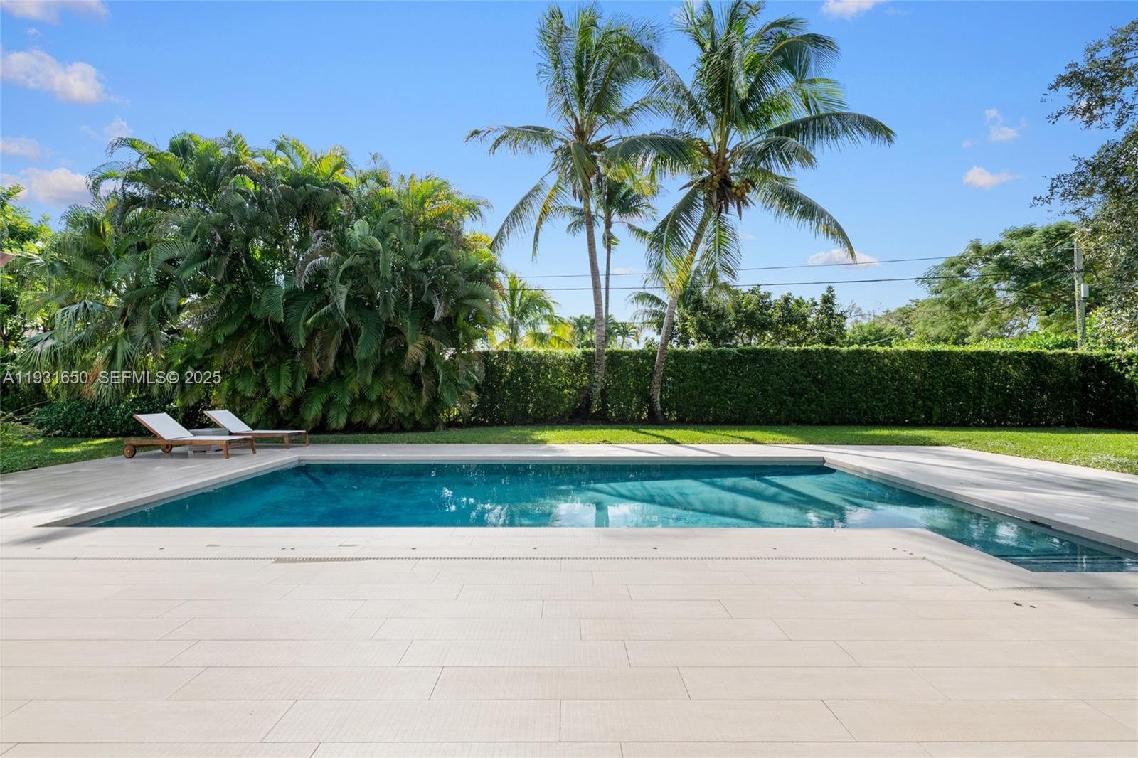 7360 Southwest 115th Street Pinecrest, FL 33156 - Photo 39 of 49 a view of a yard