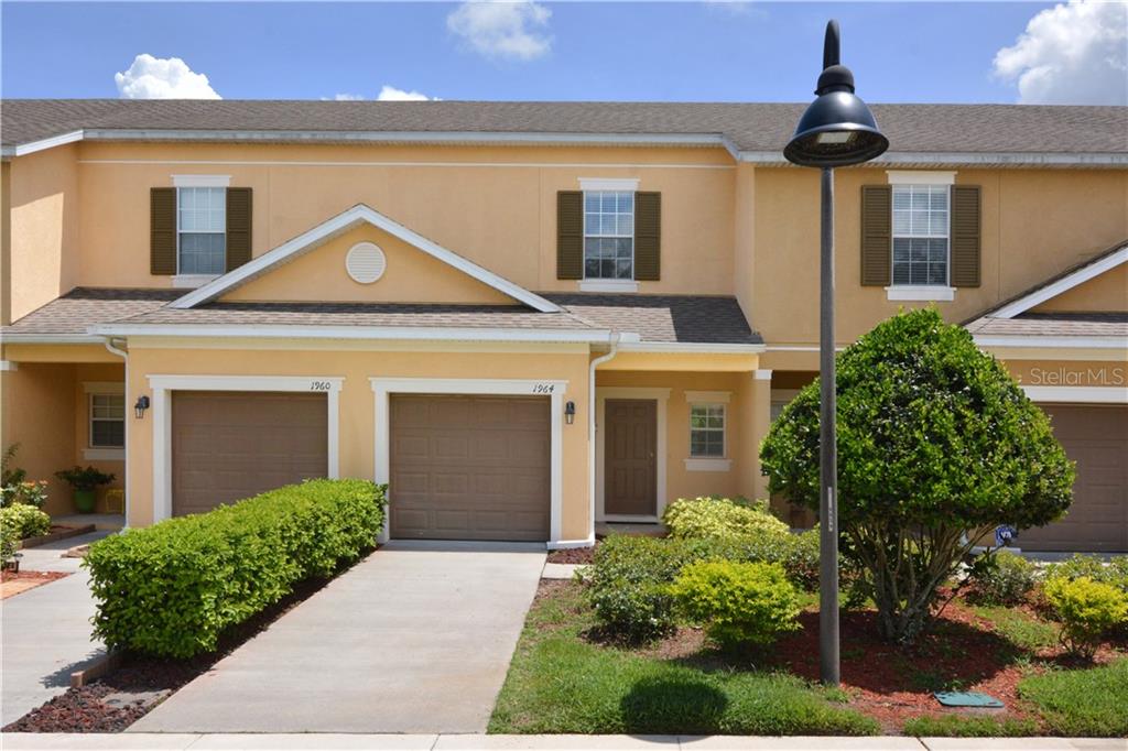 1964 Compass Flower Way Ocoee, FL 34761 - Photo 1 of 1 Welcome! Your home's lovely landscaping is maintained by the HOA.