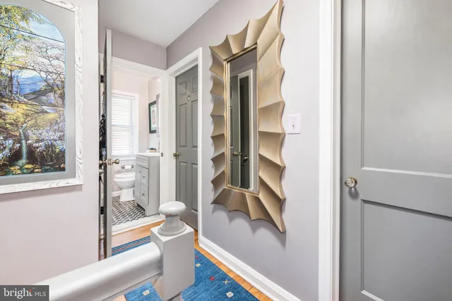 a bathroom with a tub and shower