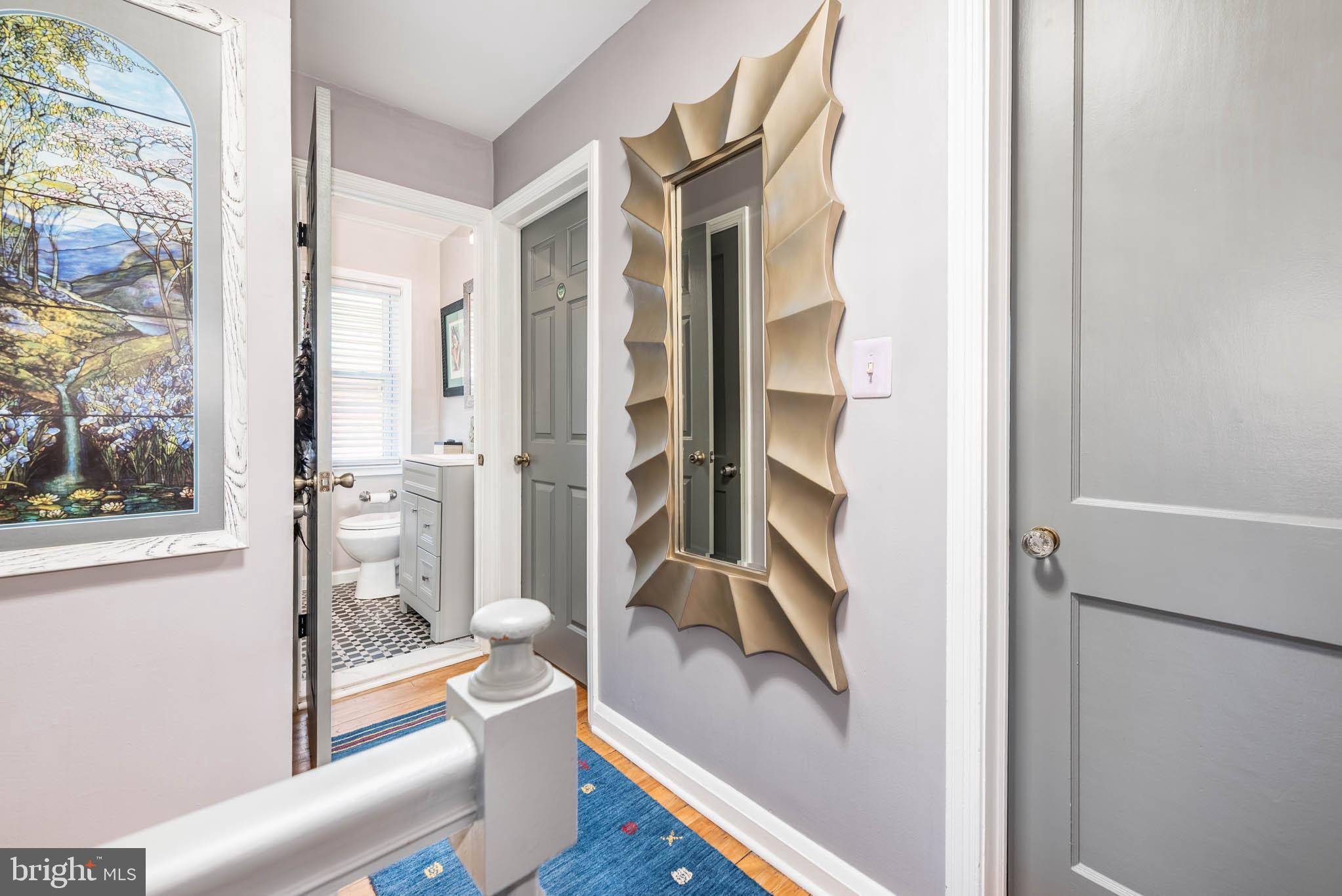 416 Imla Street Baltimore, MD 21224 - Photo 15 of 42 a bathroom with a tub and shower