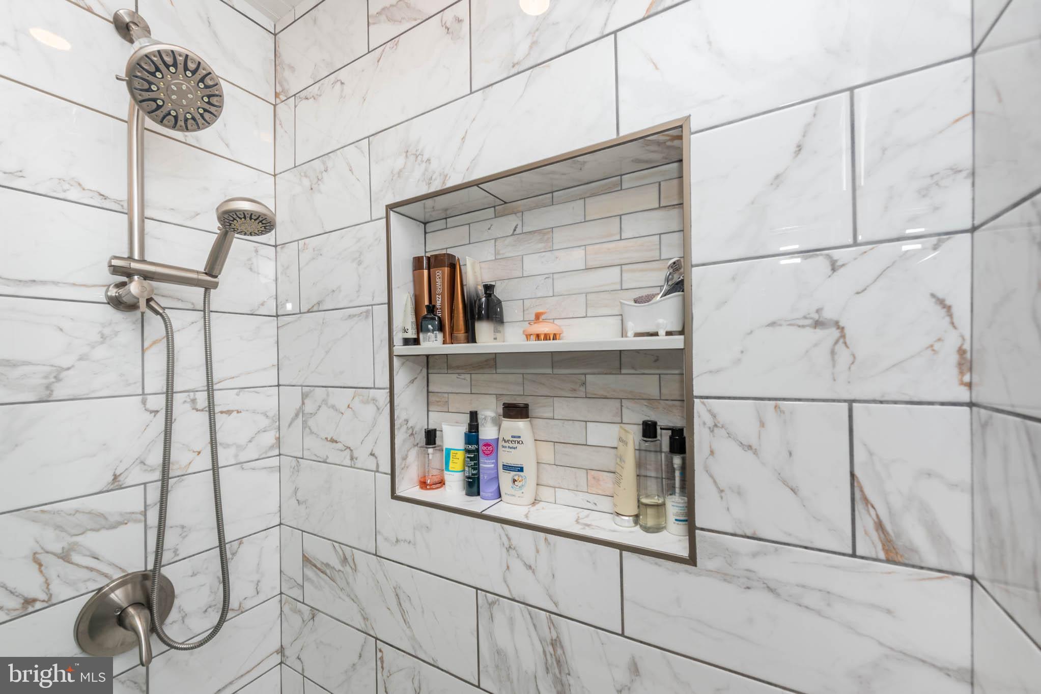 416 Imla Street Baltimore, MD 21224 - Photo 17 of 42 a bathroom with a bathtub and a shower