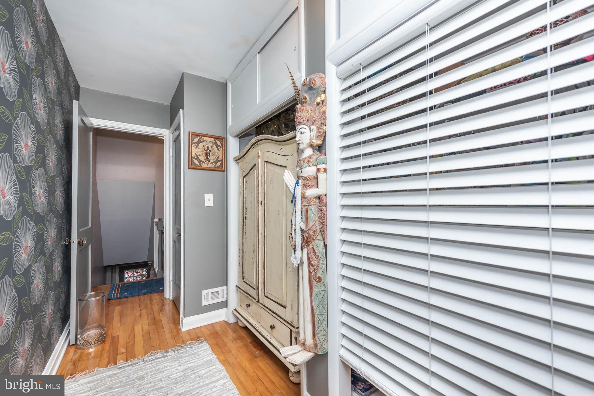 416 Imla Street Baltimore, MD 21224 - Photo 21 of 42 a view of a hallway with a furniture