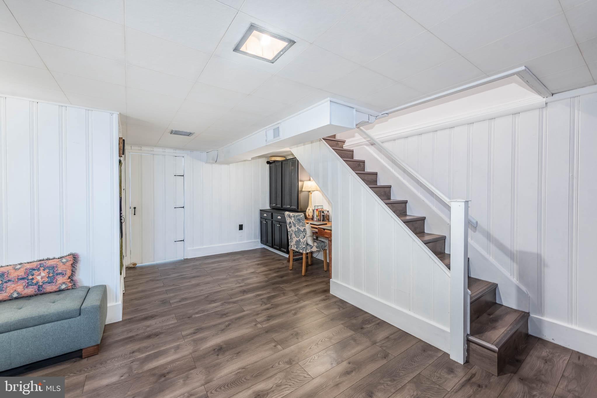 416 Imla Street Baltimore, MD 21224 - Photo 22 of 42 a view of livingroom with furniture and stairs