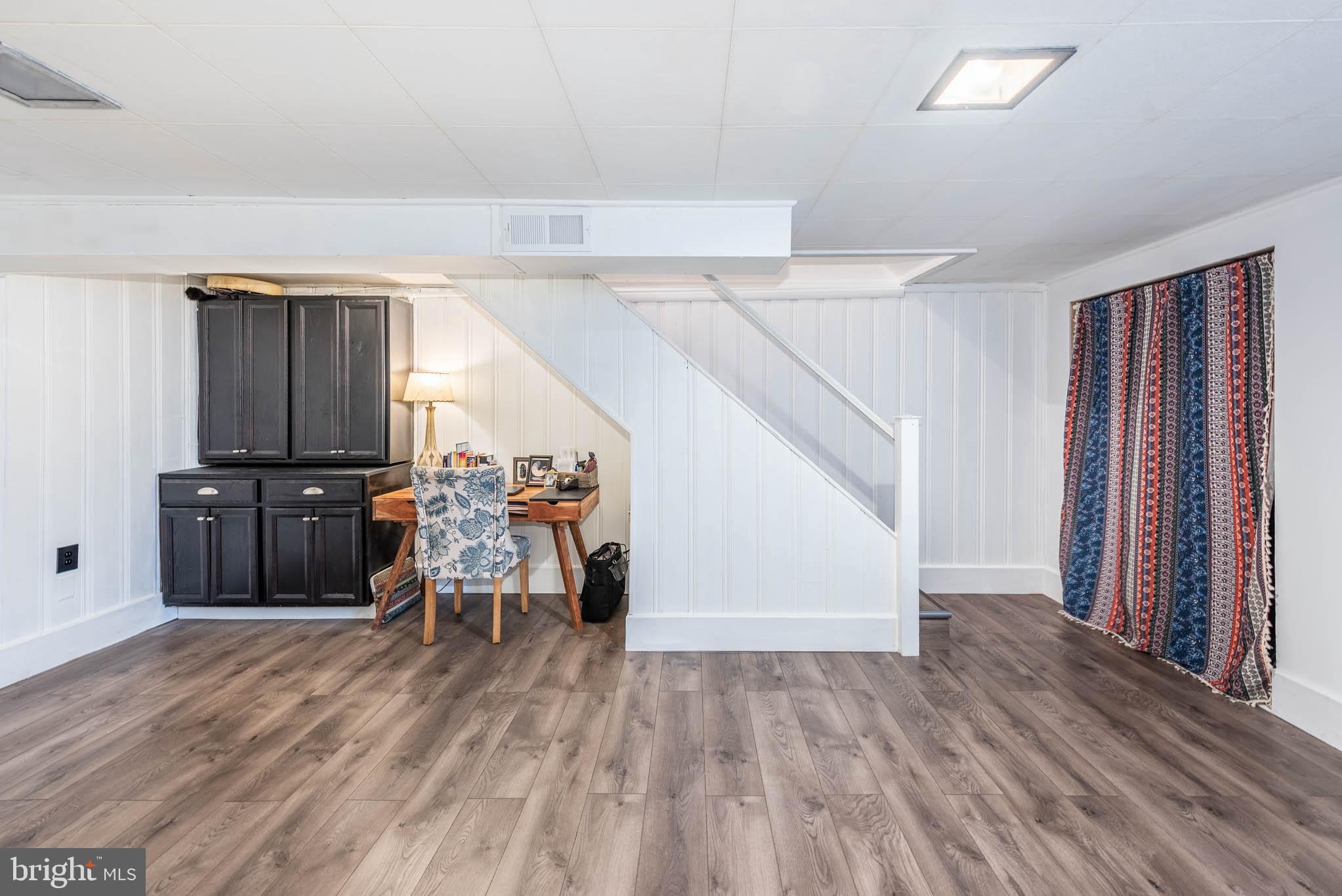 416 Imla Street Baltimore, MD 21224 - Photo 23 of 42 a view of a livingroom with furniture and a window
