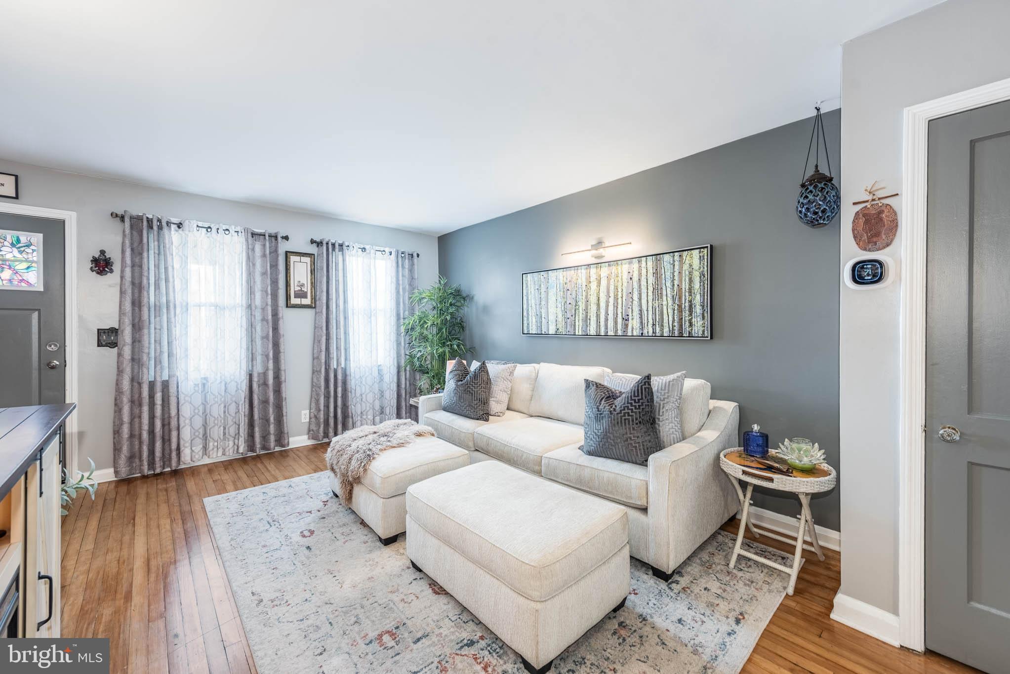 416 Imla Street Baltimore, MD 21224 - Photo 4 of 42 a living room with furniture and wooden floor