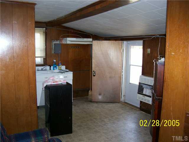 729 South Main Street Roxboro, NC 27573 - Photo 4 of 8 a room with storage and utility