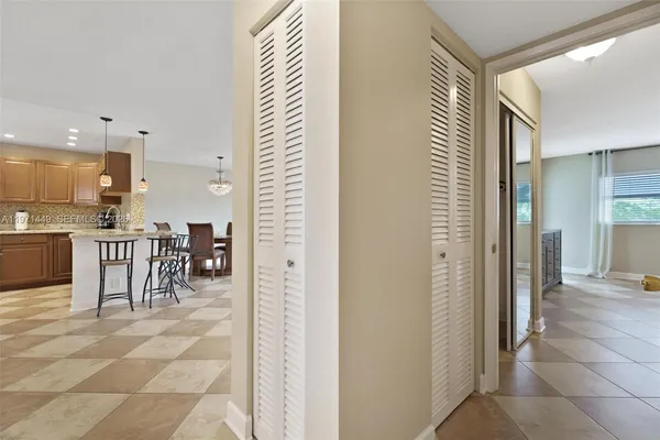 a view of a kitchen with dining area