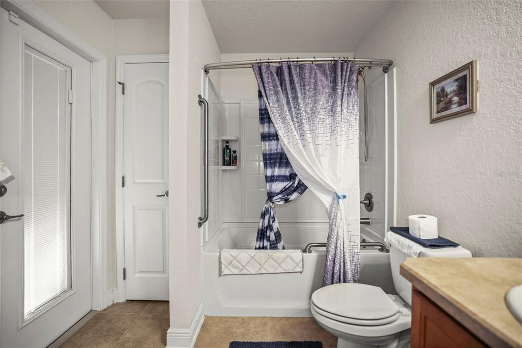 190 Rusk Circle Spring Hill, FL 34606 - Photo 20 of 35 a white toilet sitting next to a bathroom sink