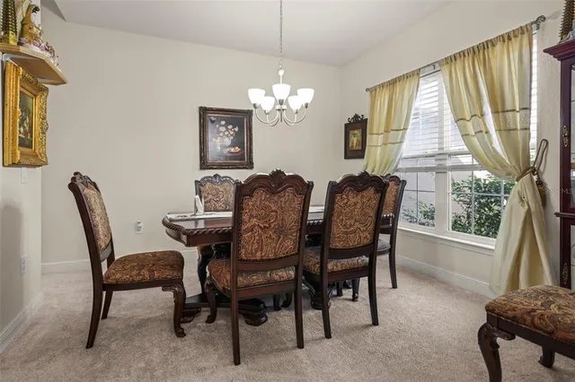 a view of a garage with a bike and a car