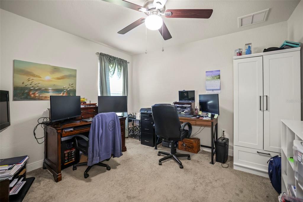 190 Rusk Circle Spring Hill, FL 34606 - Photo 26 of 35 a view of a workspace with furniture and a window
