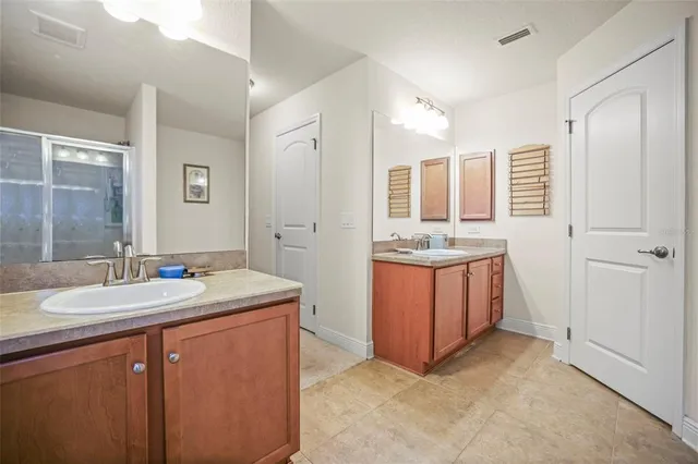 a view of a house with sitting area and garden
