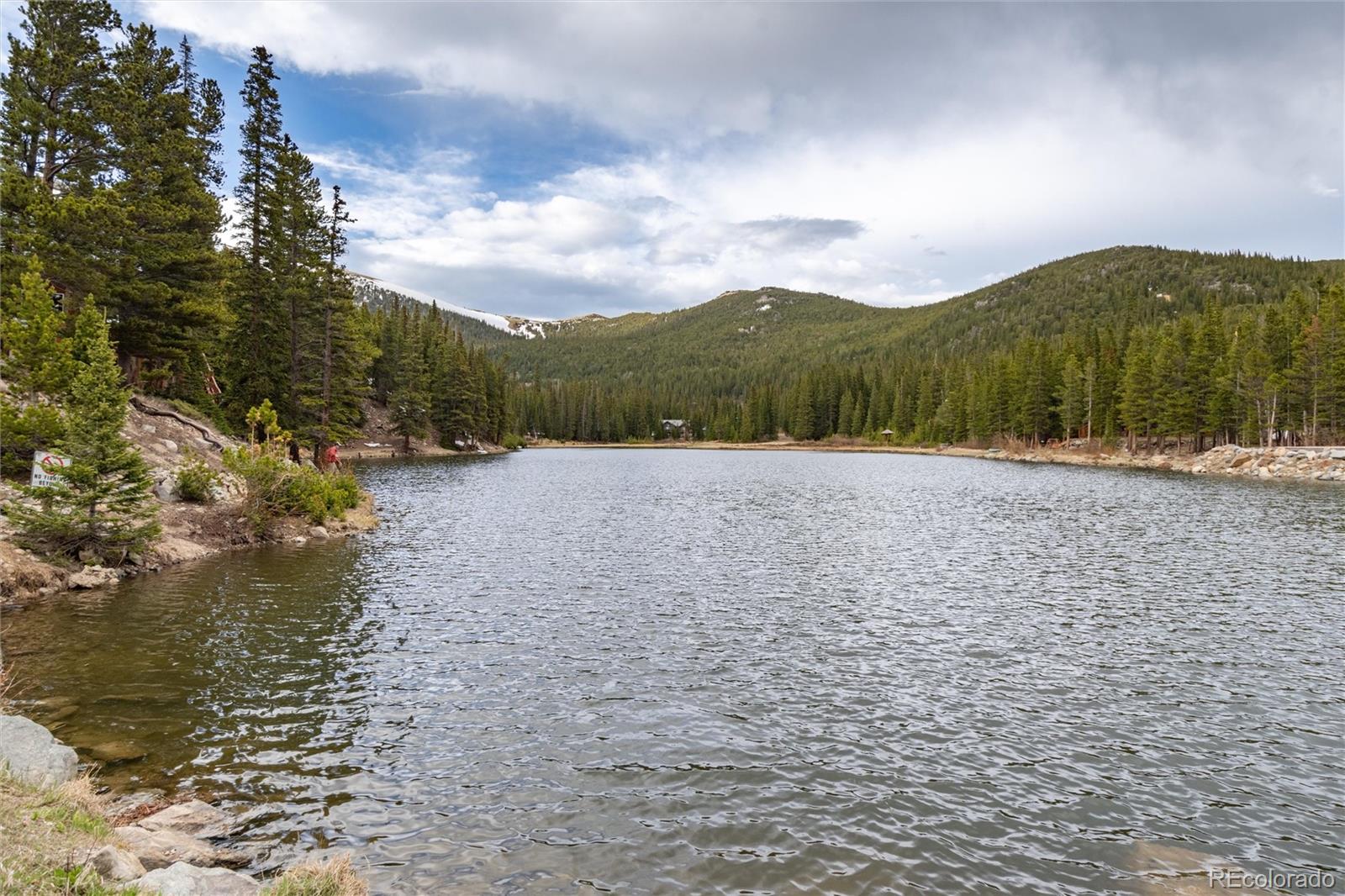 159 Lake Road Idaho Springs, CO 80452 - Photo 27 of 45 a view of lake with mountain