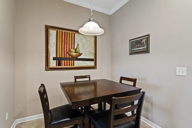 a kitchen with a sink and a large mirror