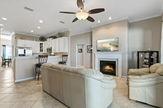 a bed room with a bed and a chair