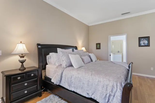 a en suite bathroom with double sink and a mirror