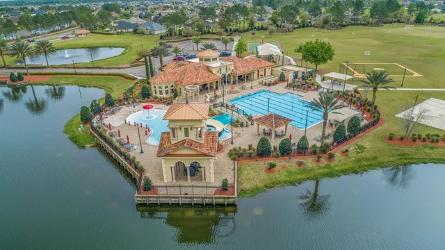 a view of a swimming pool with a patio