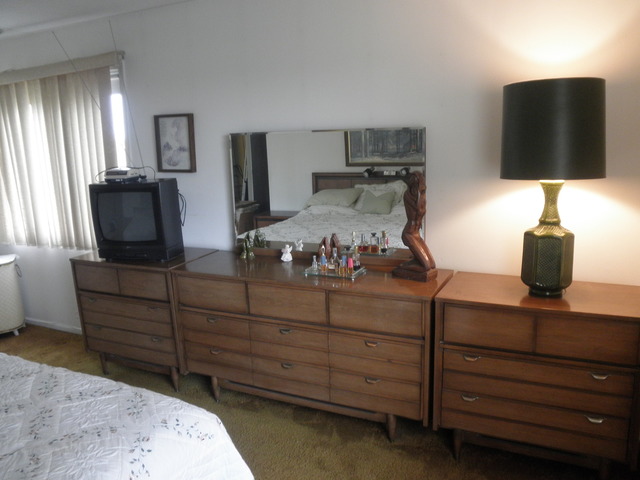 725 West Huntington Commons Road, Unit 419 Mount Prospect, IL 60056 - Photo 15 of 20 a bed room with a bed window and television