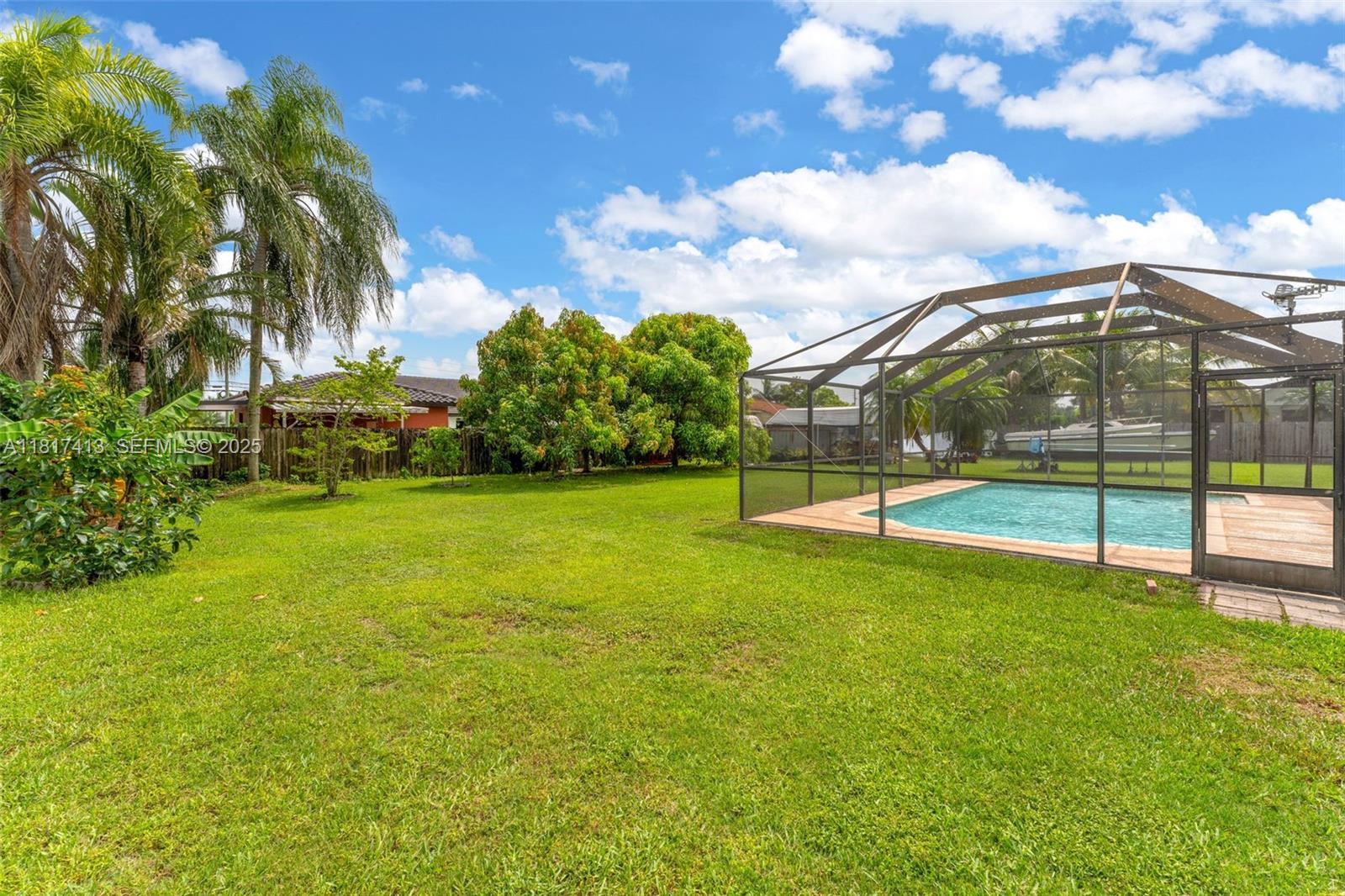 16040 Southwest 287th Street Homestead, FL 33033 - Photo 25 of 48 a view of a garden with a slide