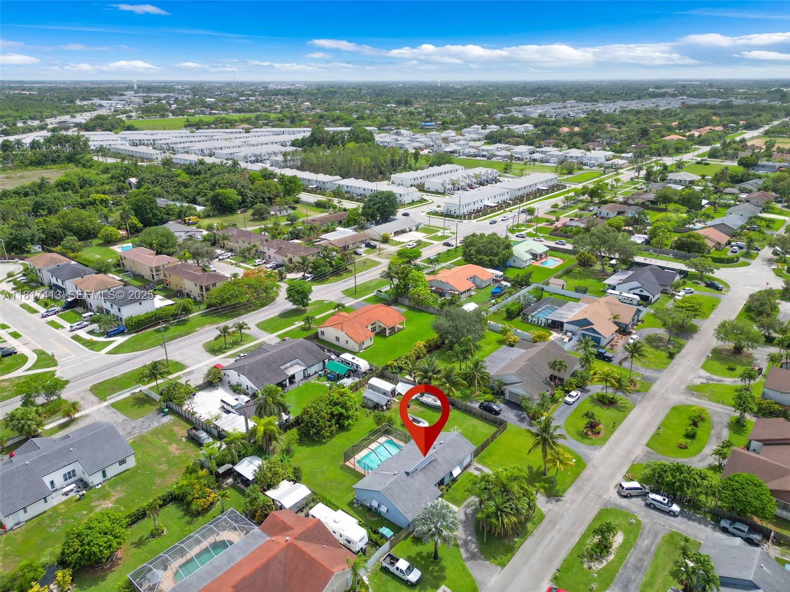 16040 Southwest 287th Street Homestead, FL 33033 - Photo 30 of 48 a view of city and green space