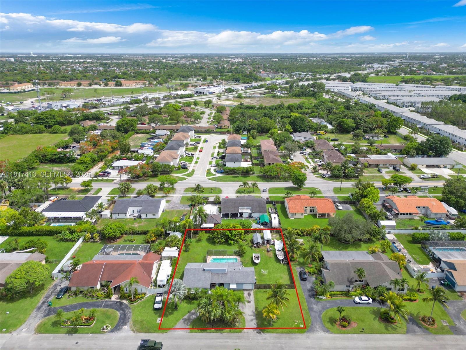 16040 Southwest 287th Street Homestead, FL 33033 - Photo 32 of 48 an aerial view of residential houses with outdoor space