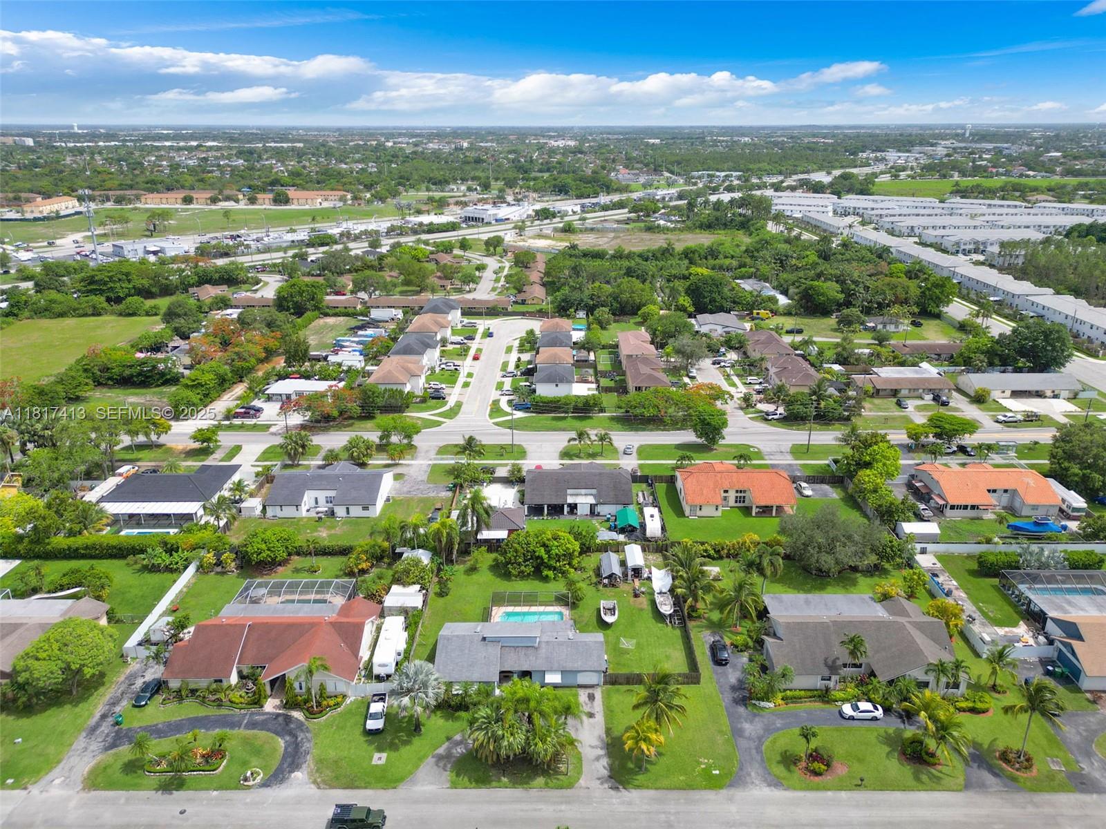 16040 Southwest 287th Street Homestead, FL 33033 - Photo 33 of 48 an aerial view of residential houses with outdoor space