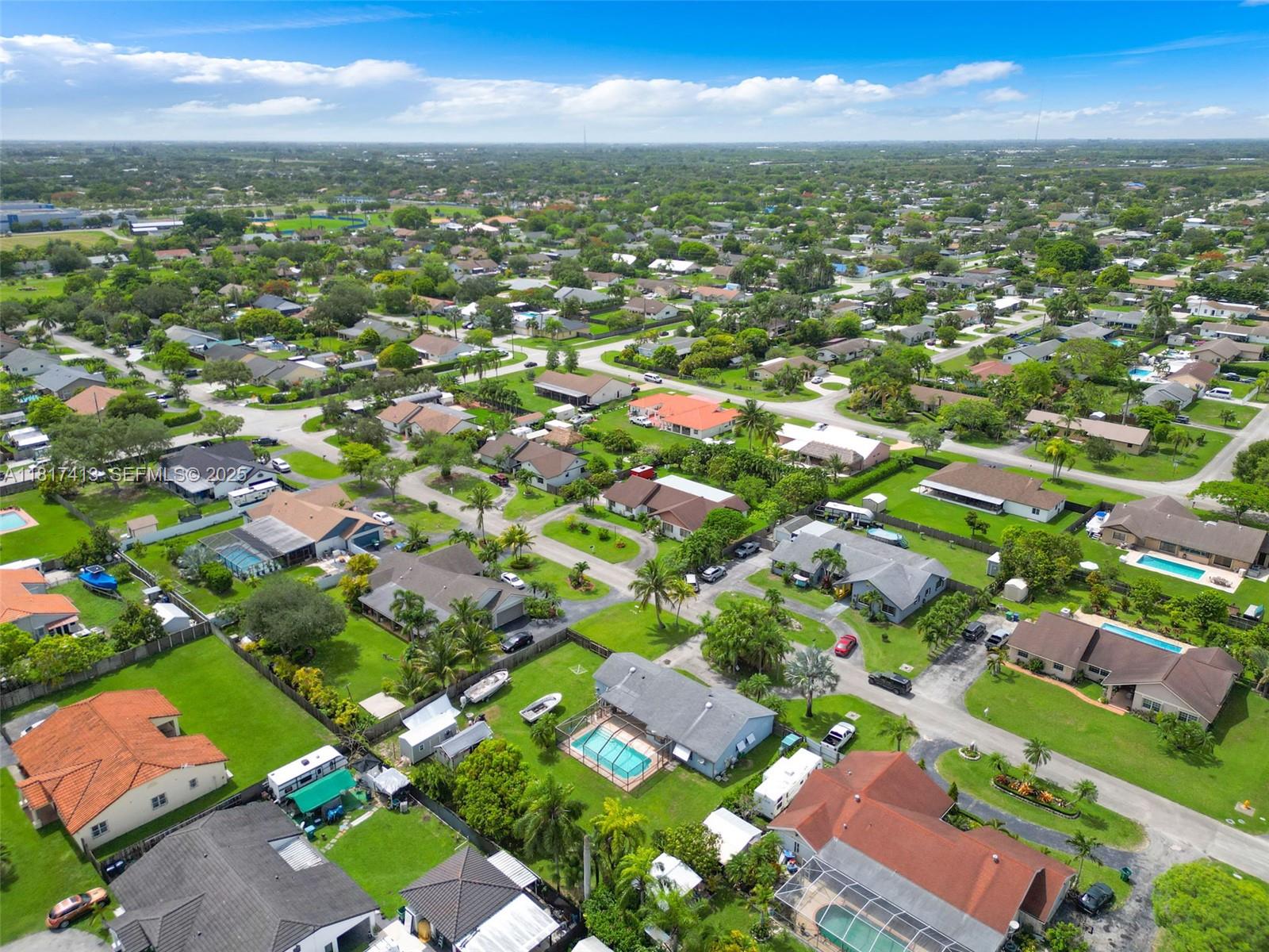 16040 Southwest 287th Street Homestead, FL 33033 - Photo 43 of 48 a view of city and building