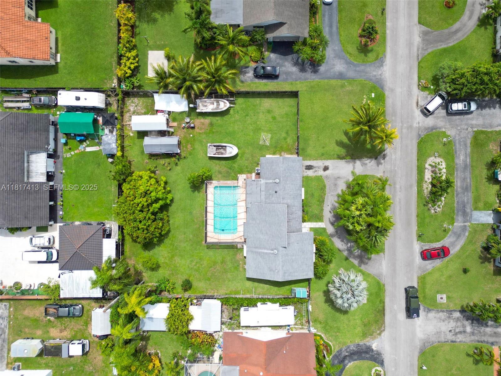 16040 Southwest 287th Street Homestead, FL 33033 - Photo 47 of 48 an aerial view of a house with a garden