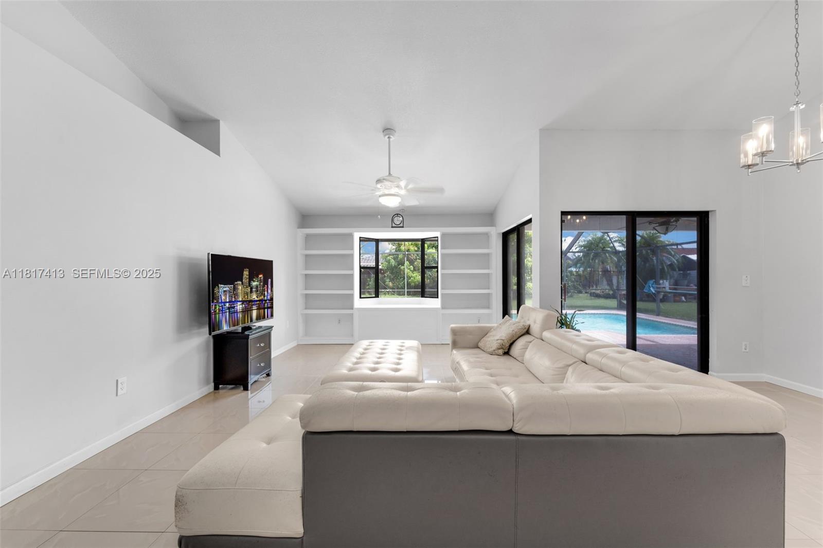16040 Southwest 287th Street Homestead, FL 33033 - Photo 5 of 48 a bed sitting in a spacious bedroom next to a window