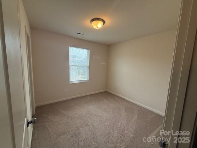 1704 Overcreek Circle Winston-Salem, NC 27127 - Photo 9 of 12 an empty room with a window