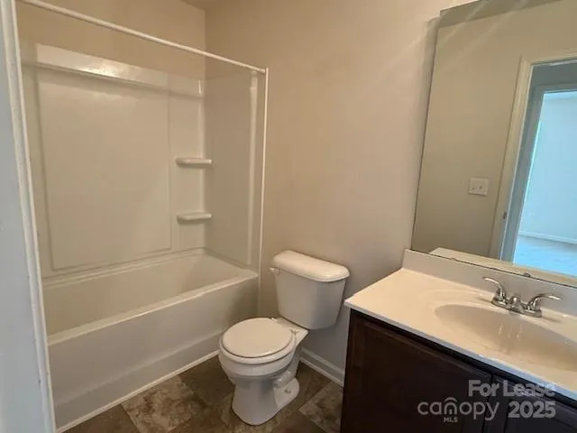 a bathroom with a sink and toilet