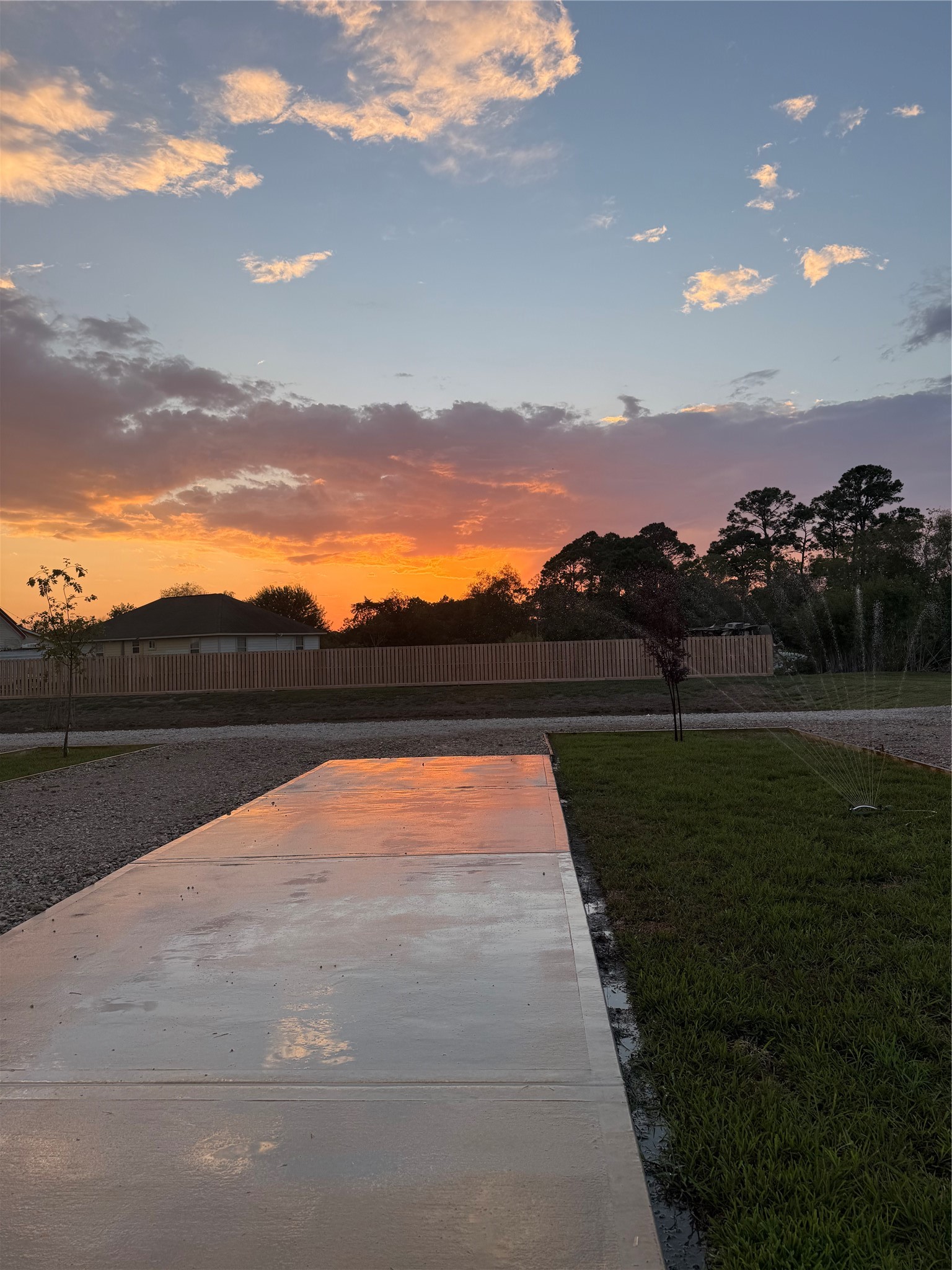 17310 Cowan Road Alvin, TX 77511 - Photo 5 of 9 a view of lake with sunset