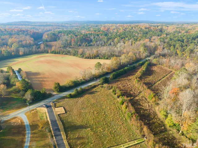 a view of residential houses with lake view