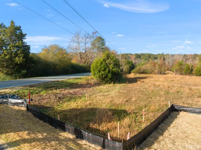 a view of a lake with a city