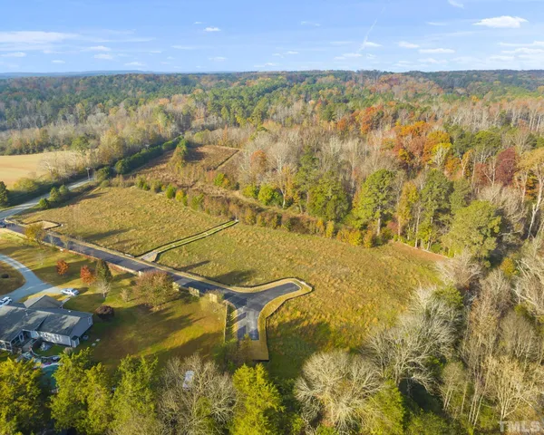 a view of swimming pool with outdoor seating and wooden floor