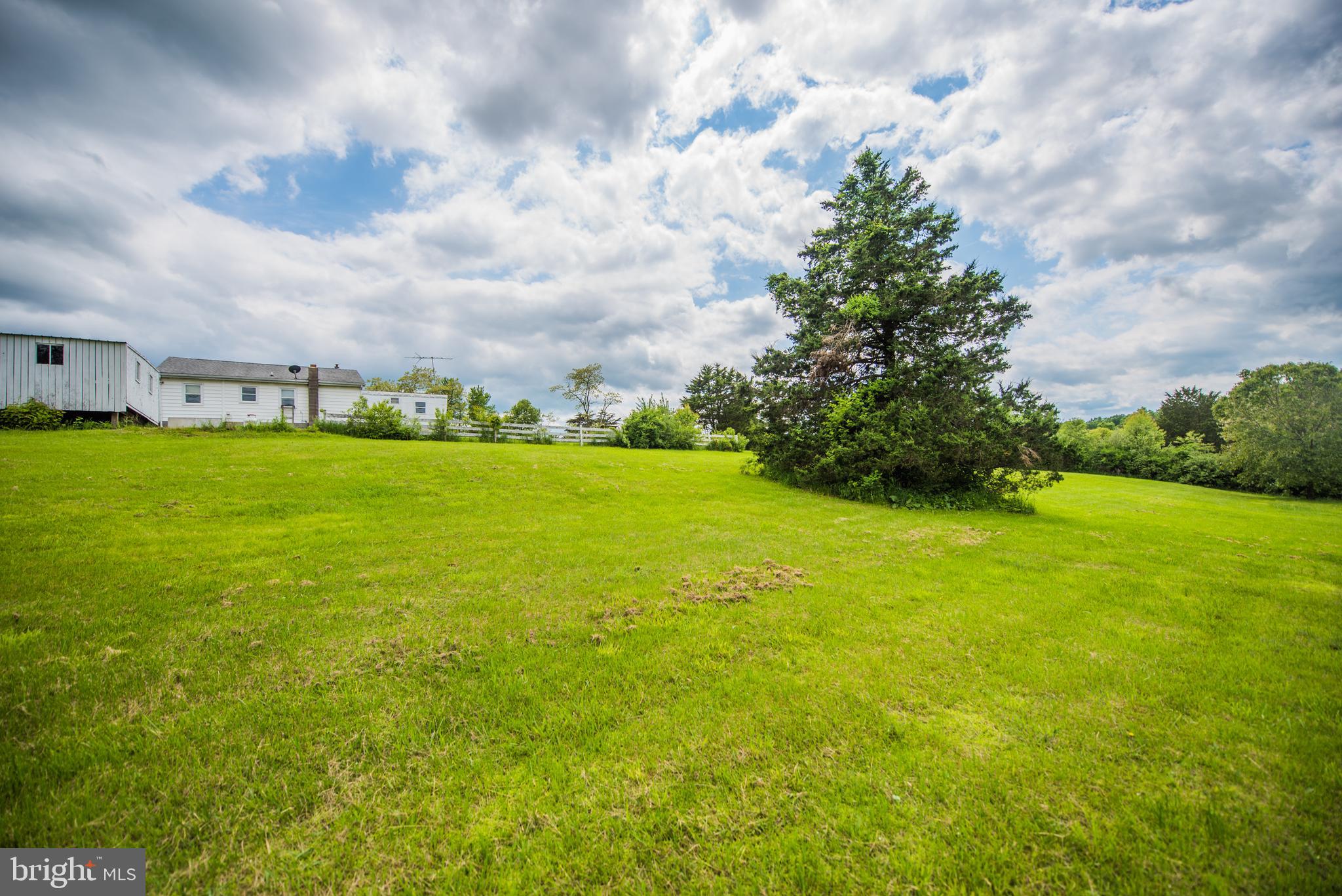 198 Packing House Road Berkeley Springs, WV 25411 - Photo 16 of 53 Back Yard and House