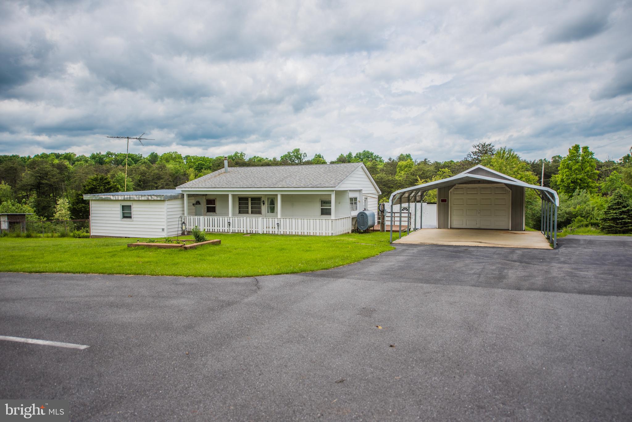198 Packing House Road Berkeley Springs, WV 25411 - Photo 51 of 53 Front View Driveway and Parking