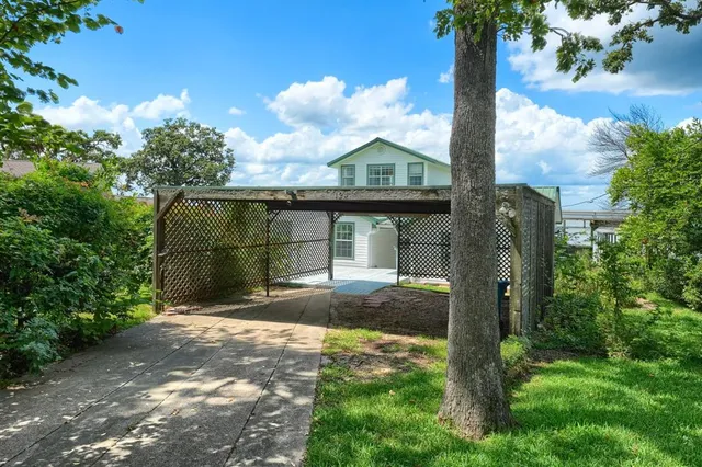 a front view of a house with a porch