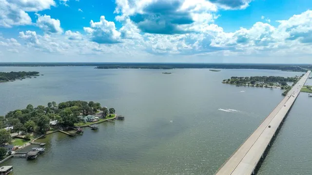 a view of a lake with a city